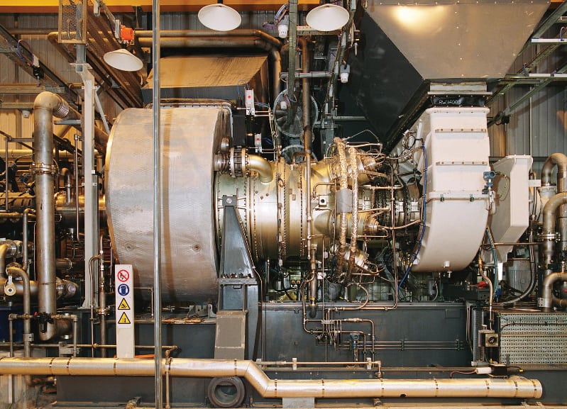 FIGURE 2.  In an example of a modern gas turbine with good aerodynamics and advanced combustion technologies, this twin-shaft gas turbine achieves a useful power output of around 13–14 MW. Thus, this gas turbine model has been used for both power generation and mechanical drive. This is an example of a modern twin-shaft gas turbine that combines aero-derivative and heavy-duty technologies in one advanced gas turbine. The turbine permits an efficiency of about 35–36% for operation in a simple cycle. Adding a heat-recovery system will the improve overall efficiency. This machine has an excellent power-to-weight ratio in its application range. (Photo used with permission from Siemens)