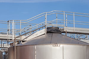 Figure 3.  A metal catwalk on the roof of a storage tank provides some protection for workers, as it is unsafe for personnel to walk directly on a tank’s shell