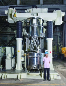 FIGURE 2. The agitators in this 300-gal planetary disperser are lifted out of the vessel via a dual-post hydraulic lift, allowing complete access for cleaning and maintenance