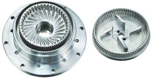 FIGURE 5 (Shown here are some examples of the rotor-stators used in modern ultra-high shear mixers. The combination of high tip speed and extremely close tolerances between the interlocking channels subjects the product to intense shear in a single pass. The gap between adjacent surfaces of the rotor and stator is adjustable, allowing operators to fine-tune shear levels and flowrates