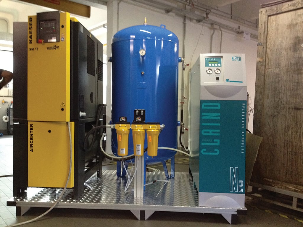 FIGURE 3.  A typical onsite PSA system uses two vessels, both filled with CMS pellets. They operate in an alternating mode, so that at any time, one is in pressurization mode to enable air separation (to allow the nitrogen product stream to be collected), while the other tank is in depressurization mode, to allow the adsorbed oxygen to be released to the atmosphere (Credit: Claind S.r.l.)