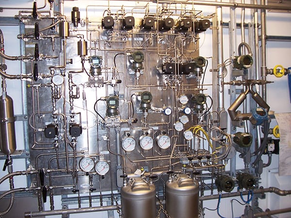FIGURE 4.  This sampling system for an analyzer installed in a petroleum refinery provides an idea of the complexity of measuring the critical attributes of gasoline